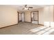Generous bedroom leads to additional rooms, creating versatile living spaces for Gathering and guests at 1120 Antelope W Dr, Bennett, CO 80102