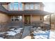 Charming front porch featuring stone accents and a walkway leading to the front door, enhancing curb appeal at 1120 Antelope W Dr, Bennett, CO 80102