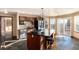 Well-equipped kitchen featuring a central island, sleek appliances, and plenty of natural light, perfect for cooking at 1120 Antelope W Dr, Bennett, CO 80102