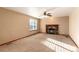Cozy living room with fireplace offers a relaxing atmosphere, perfect for entertaining or quiet evenings at 1120 Antelope W Dr, Bennett, CO 80102