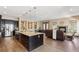 Open concept floor plan with kitchen, Gathering and living room areas at 24322 E Mineral Dr, Aurora, CO 80016