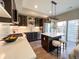 Stylish kitchen featuring a central island, modern appliances, and sleek cabinetry at 2879 W Parkside Pl, Denver, CO 80221