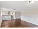 Spacious basement with wood-look floors and stairs leading to the upper level at 16652 E Gunnison Pl, Aurora, CO 80017
