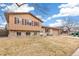 Well-maintained home with a combination of brick and siding facade and a two-car garage at 16652 E Gunnison Pl, Aurora, CO 80017