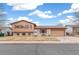 Classic two-story home featuring brick and siding exterior with a two-car garage at 16652 E Gunnison Pl, Aurora, CO 80017