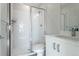 Modern bathroom featuring a glass shower enclosure with white subway tile and chrome fixtures at 2350 Tremont Pl # 19, Denver, CO 80205