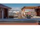 Relax on this scenic rooftop patio complete with stylish pergola, mountain views, and outdoor seating at 2350 Tremont Pl # 19, Denver, CO 80205