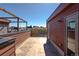 Stunning rooftop patio featuring wood pergola and city views, perfect for outdoor entertaining and relaxation at 2350 Tremont Pl # 19, Denver, CO 80205