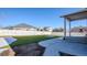 View of backyard with patio and artificial turf at 5471 Scenic Ave, Firestone, CO 80504