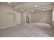 Open basement area featuring a staircase and versatile space at 16043 Bridle Ridge Dr, Monument, CO 80132
