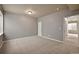 Neutrally decorated bedroom featuring carpet and a doorway entrance at 16043 Bridle Ridge Dr, Monument, CO 80132