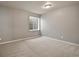 Neutral-toned bedroom features carpet and a window providing natural light at 16043 Bridle Ridge Dr, Monument, CO 80132