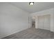Spacious bedroom featuring a closet and an open doorway at 16043 Bridle Ridge Dr, Monument, CO 80132