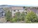 Back view of house with a view of the mountains in the background at 16043 Bridle Ridge Dr, Monument, CO 80132