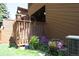Relaxing back deck surrounded by lush landscaping offering a private retreat at 283 Yank Ct, Lakewood, CO 80228