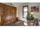 Elegant entryway featuring double doors, natural light, and stylish decor at 283 Yank Ct, Lakewood, CO 80228