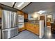 Spacious kitchen with stainless steel refrigerator and view of the breakfast nook at 283 Yank Ct, Lakewood, CO 80228
