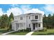 Charming townhome featuring stone accents, siding, a covered porch, and manicured landscaping in a desirable neighborhood at 1364 Penner Dr, Erie, CO 80026