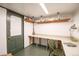 Finished basement with custom built-in desk and shelving at 4467 W 30Th Ave, Denver, CO 80212