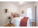 Bright bedroom with soft lighting, plush bedding, neutral tones, and elegant decor at 4467 W 30Th Ave, Denver, CO 80212
