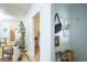 Hallway view through to bedroom, and onward to kitchen in neutral color palette at 4467 W 30Th Ave, Denver, CO 80212
