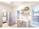 View of the kitchen with stainless steel appliances and access to the backyard at 4467 W 30Th Ave, Denver, CO 80212