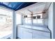 Laundry room featuring white cabinets and an outdoor view at 4467 W 30Th Ave, Denver, CO 80212
