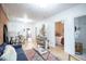 Stylish living room with a view into bedroom and hallway, and neutral color palette at 4467 W 30Th Ave, Denver, CO 80212