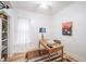 Cozy home office featuring a vintage desk, natural light, and calming decor at 4467 W 30Th Ave, Denver, CO 80212