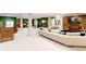 Finished basement with a bar and comfortable seating area at 6816 Goldbranch Dr, Niwot, CO 80503