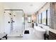 Luxurious bathroom with soaking tub and walk-in shower at 6816 Goldbranch Dr, Niwot, CO 80503