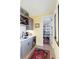 Butlers pantry with wine storage, wet bar, and ample shelving at 6816 Goldbranch Dr, Niwot, CO 80503