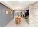 Basement dining room with a rustic table at 6816 Goldbranch Dr, Niwot, CO 80503