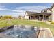 Hot tub with a view of the backyard and surrounding landscape at 6816 Goldbranch Dr, Niwot, CO 80503