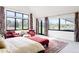 Main bedroom with access to backyard and large windows at 6816 Goldbranch Dr, Niwot, CO 80503