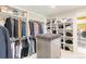 Large walk-in closet with ample shelving and drawers at 6816 Goldbranch Dr, Niwot, CO 80503
