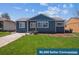 Charming single-story home featuring a well-maintained lawn and inviting curb appeal at 2285 Fulton St, Aurora, CO 80010