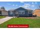 Charming blue house with a well-maintained front yard and $5,000 seller concession at 2285 Fulton St, Aurora, CO 80010