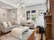 Cozy living room with hardwood floors, a decorative fireplace, and neutral decor, creating a relaxing atmosphere at 1423 Elizabeth St, Denver, CO 80206