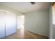 Modest bedroom with tile flooring and a sliding-door closet at 1838 Cedar St, Broomfield, CO 80020