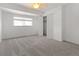 Inviting bedroom with carpet, a closet, window and ceiling fan at 8678 Mariposa St, Thornton, CO 80260