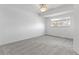 Neutral bedroom offering bright window, ceiling fan, and plush carpeting at 8678 Mariposa St, Thornton, CO 80260