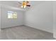 Bright, airy bedroom with neutral carpet, a ceiling fan and a window with natural light at 8678 Mariposa St, Thornton, CO 80260