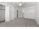 Spacious bedroom with closet, carpet, and ensuite bathroom entrance at 8678 Mariposa St, Thornton, CO 80260