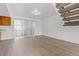 Bright space with hardwood floors and a sliding glass door leading to the outdoor area at 8678 Mariposa St, Thornton, CO 80260