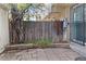 Enclosed patio area with privacy fence and stone accents, ideal for outdoor living at 8678 Mariposa St, Thornton, CO 80260