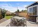 Outdoor dining area with a patio and a well-maintained backyard at 1534 Meade St, Denver, CO 80204