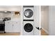 Convenient laundry closet with stacked washer and dryer adjacent to kitchen, maximizes space at 1534 Meade St, Denver, CO 80204