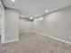 Spacious, carpeted basement area with recessed lighting and a window at 8595 Field Ct, Arvada, CO 80005