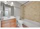 This bathroom is complete with a vanity sink, toilet, and shower at 8595 Field Ct, Arvada, CO 80005